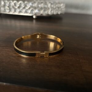 Elegant Gold and Black Bracelet